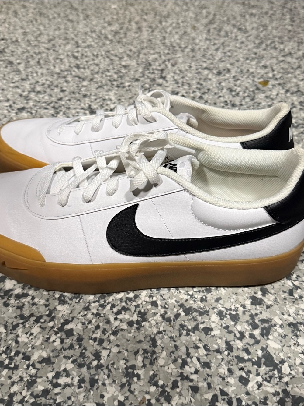 Nike Men’s White Sneakers with Black Swoosh and Gum Sole